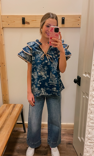 Blue Ruffle Top w/ tan Trim